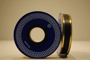 Díszszalag tekercs, 50m, arany-fekete